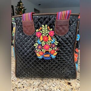 Consuela black quilted tote with floral embroidery